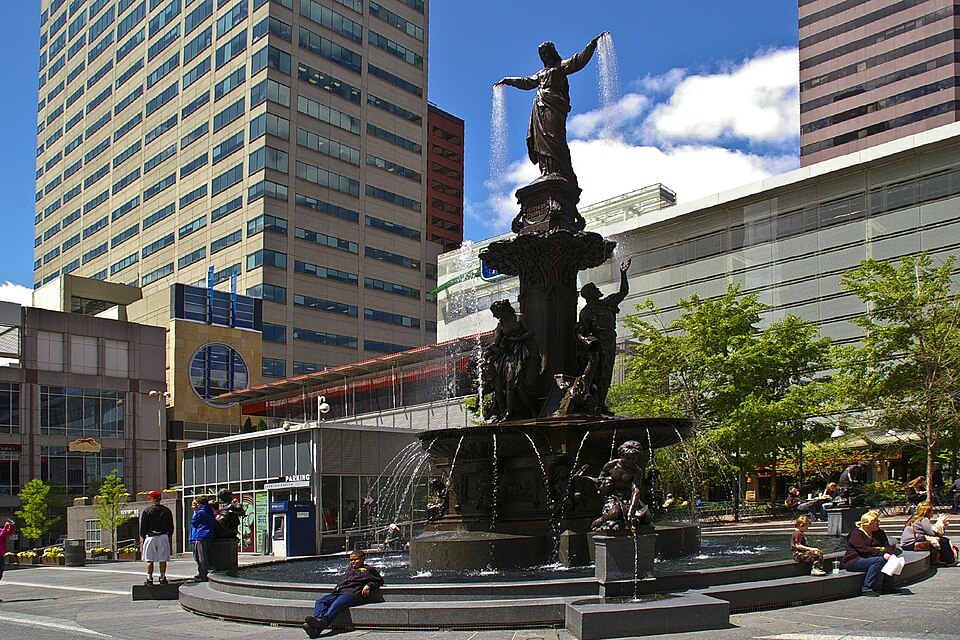 Downtown Cincinnati Ohio skyline and Fifth Street commercial corridor surrounding Fountain Square in Hamilton County
